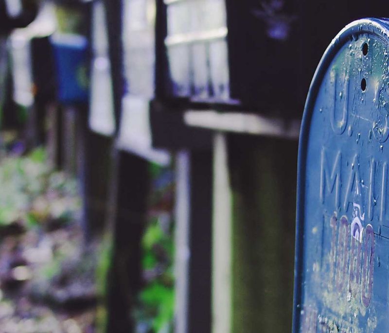 line of metal mailboxes